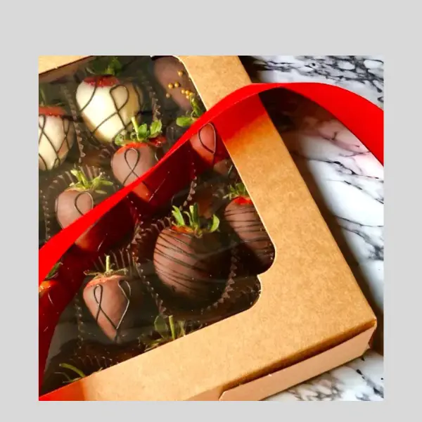 Fresh Strawberries dip to a chocolate fountain